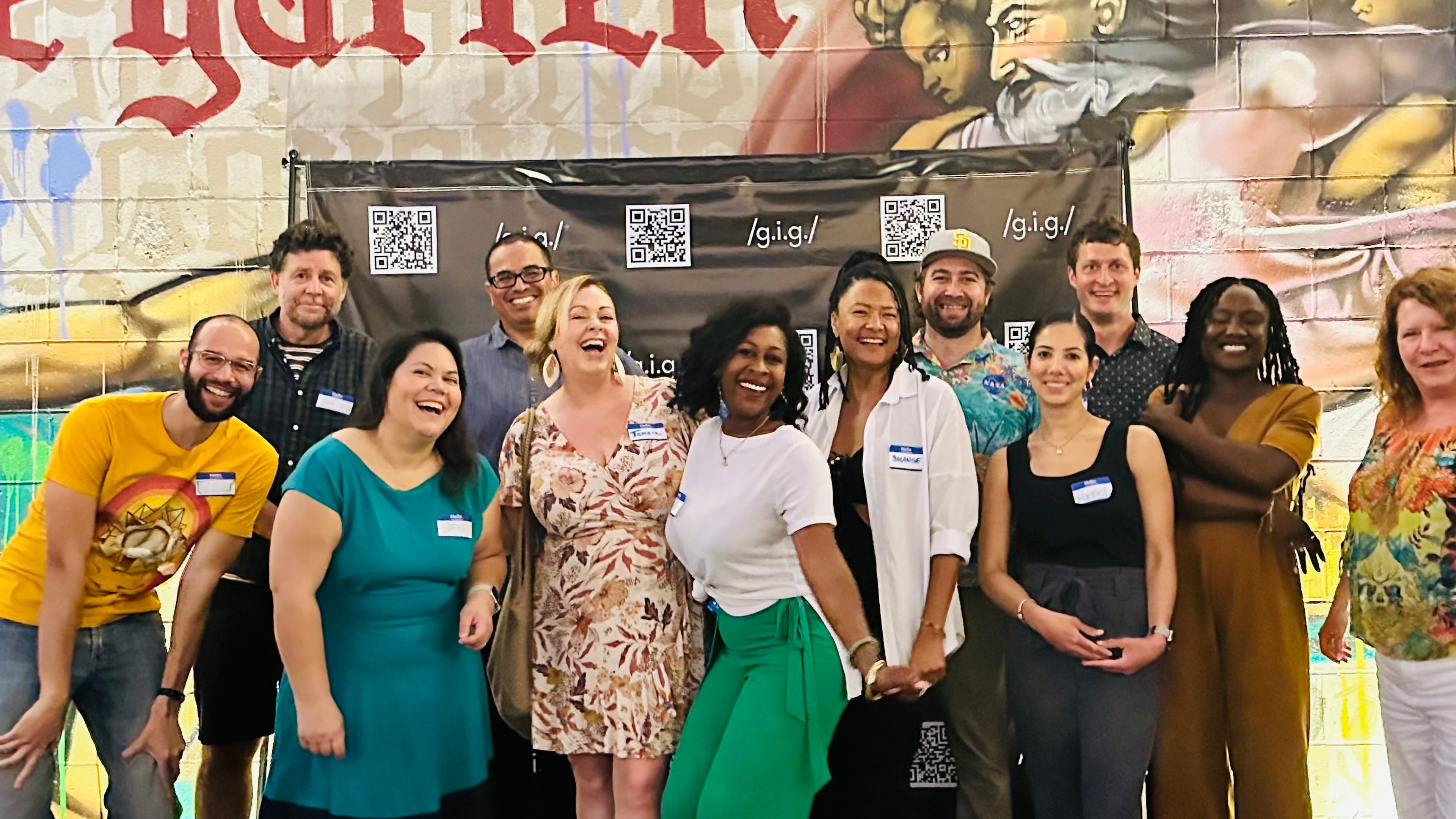 Large community group photo at a WeBeGiggin event